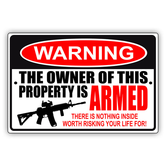 Warning the owner of this property is armed aluminum metal sign