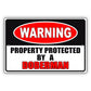 Warning property protected by a doberman aluminum metal sign
