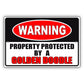 Warning property protected by a golden doodle aluminum metal sign