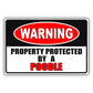 Warning property property by a poodle aluminum metal sign