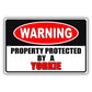 Warning property protected by a yorkie aluminum metal sign
