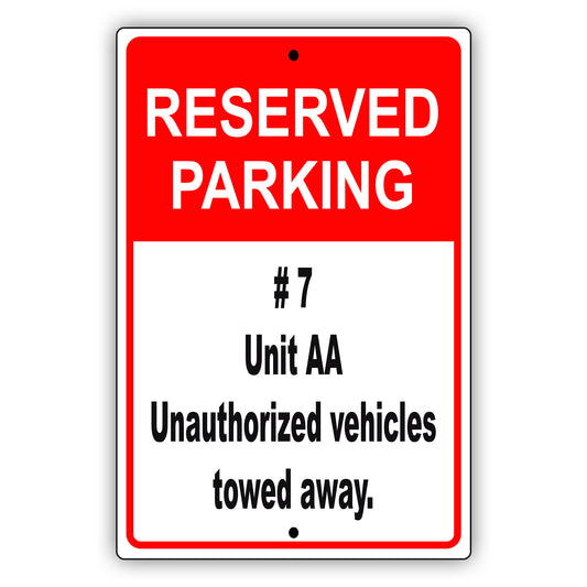 Reserved parking #7 unit aa unauthorized vehicles towed away aluminum metal sign
