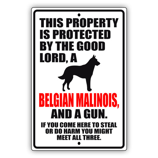 This property is protected by the good lord a belgian malinois and a gun aluminum metal sign