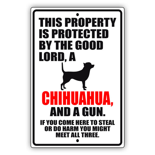 This property is protected by the good lord a chihuahua and a gun aluminum metal sign