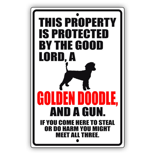 This property is protected by the good lord a golden a golden doodle and a gun aluminum metal sign