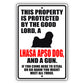 This property is protected by the good lord a lhasa apso dog and a gun aluminum metal sign