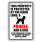 This property is protected by the good lord a poodle and a gun aluminum metal sign