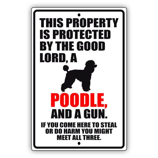 This property is protected by the good lord a poodle and a gun aluminum metal sign