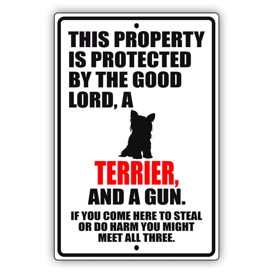 This property is protected by the good lord a terrier and a gun aluminum metal sign