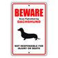 Beware area patrolled by dachshund aluminum metal sign