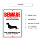 Beware area patrolled by dachshund aluminum metal sign