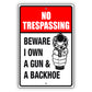 No trespassing beware I own a gun & a backhoe aluminum metal sign