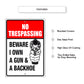 No trespassing beware I own a gun & a backhoe aluminum metal sign
