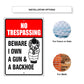 No trespassing beware I own a gun & a backhoe aluminum metal sign