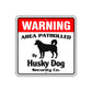 Warning Area Patrolled By Husky Dog Sign