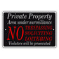 private property area under surveillance sign board