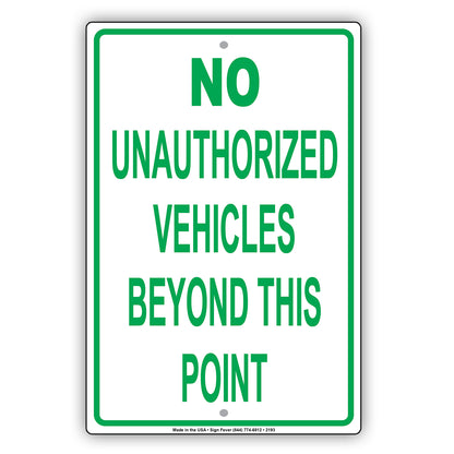 No Unauthorized Vehicles Beyond This Point Sign