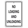 No Loading And Unloading Violators Will Be Towed Sign