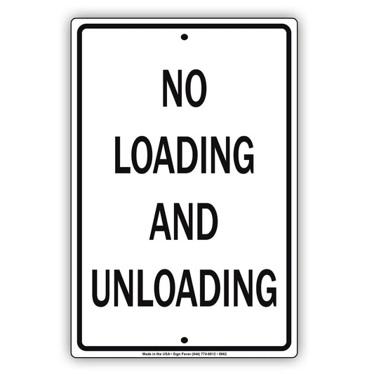No Loading And Unloading Violators Will Be Towed Sign
